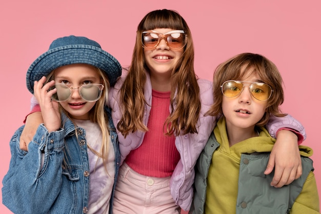 Portrait of teenagers posing and wearing sunglasses