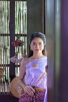 https://img.freepik.com/free-photo/portrait-thai-woman-retro-thai-dress_69709-1641.jpg?size=338&ext=jpg