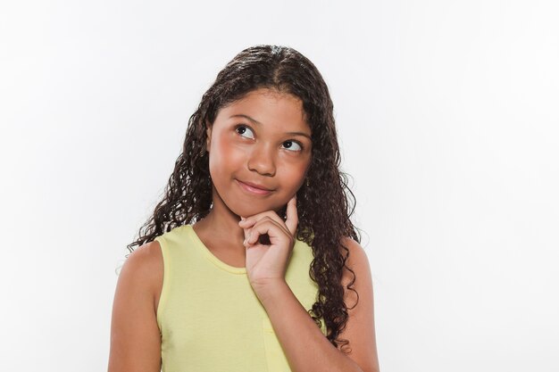 Portrait of a thoughtful girl on white background