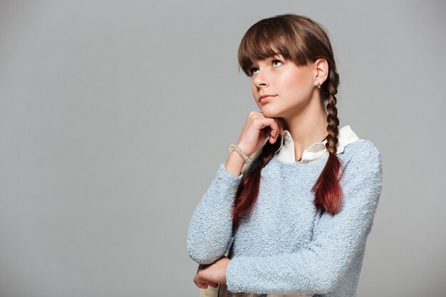 Portrait of a thoughtful young schoolgirl