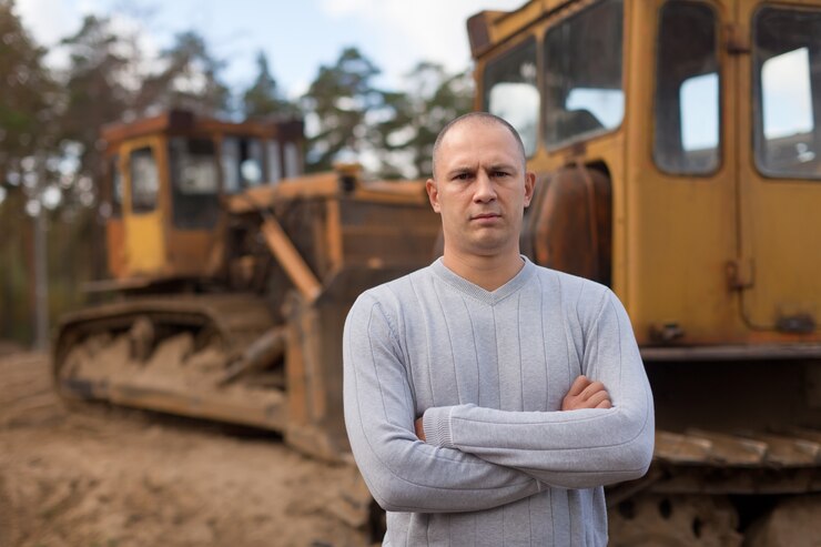 Free Photo portrait of tractor operator