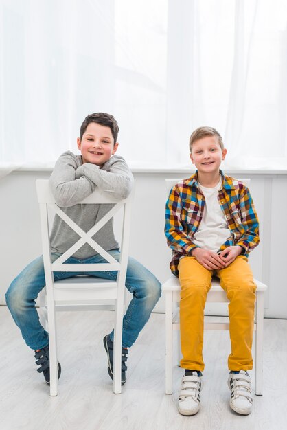 Portrait of two boys at home