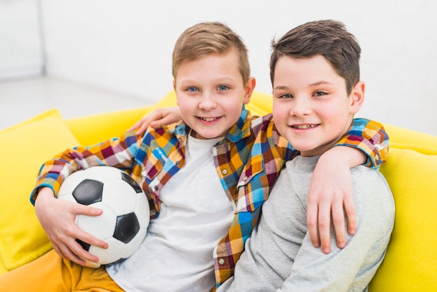 Portrait of two boys at home