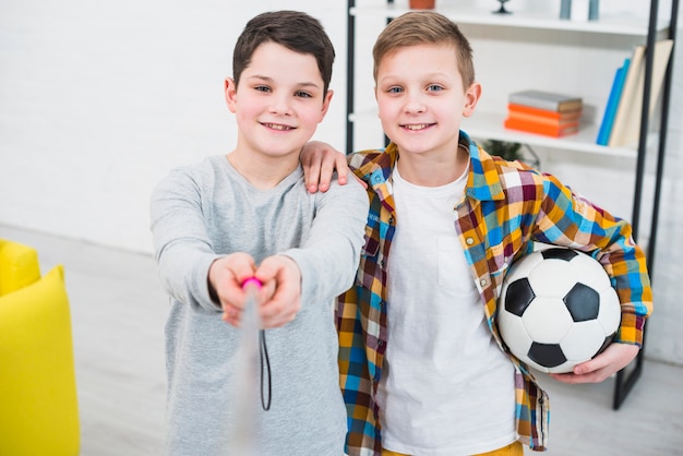 Free photo portrait of two boys at home