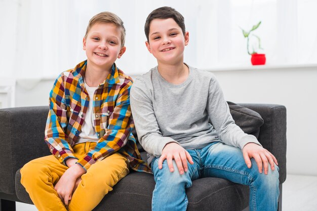 Portrait of two boys at home