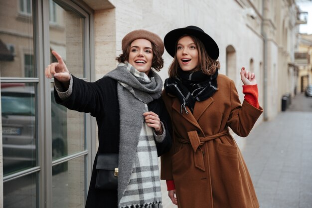 Portrait of two excited girls