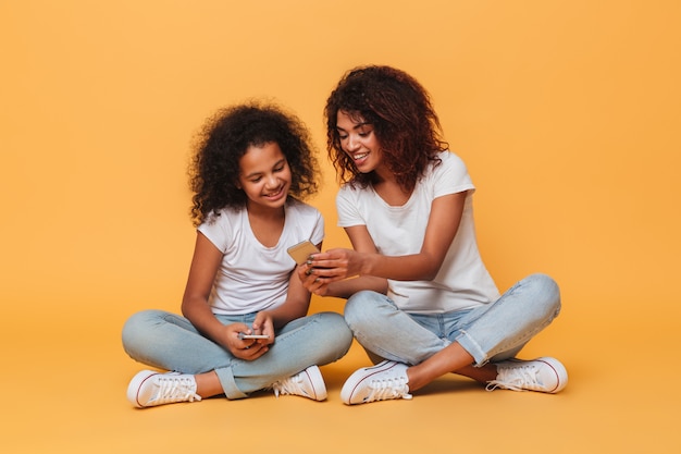 Portrait of a two happy afro american sisters