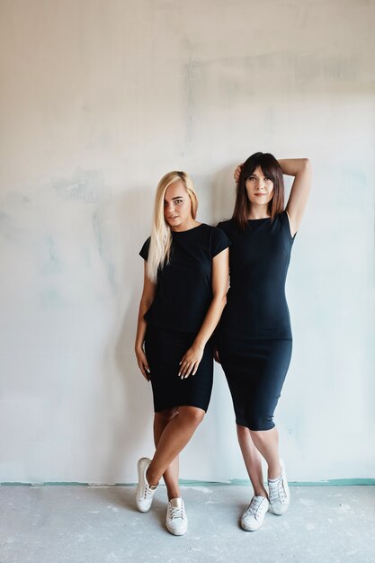 Portrait of two women model posing