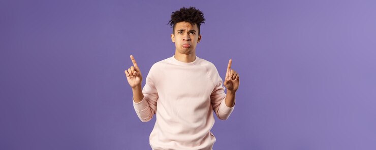 Free Photo portrait of upset distressed young gloomy guy missed good opportunity envy or jealous not having som