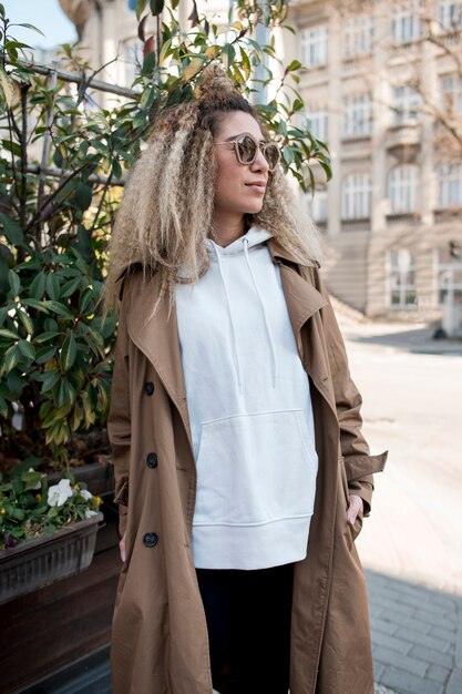 Portrait of urban woman posing outdoors