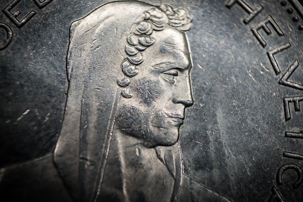 Free photo portrait of william tell from 5 franc coin, switzerland. macro photo