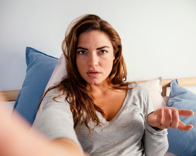 Portrait woman in bed