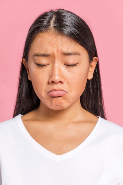 Portrait of woman being sad