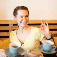 Free photo portrait of woman communicating through sign language