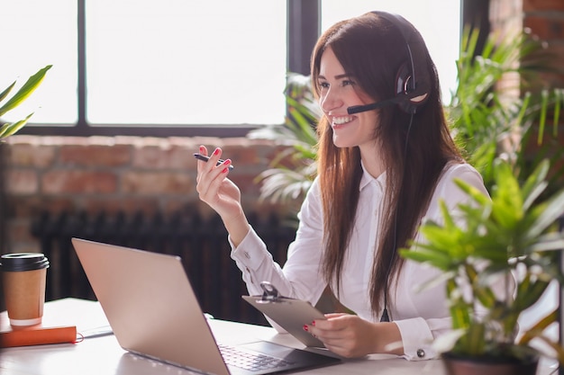 Portrait of woman customer service worker