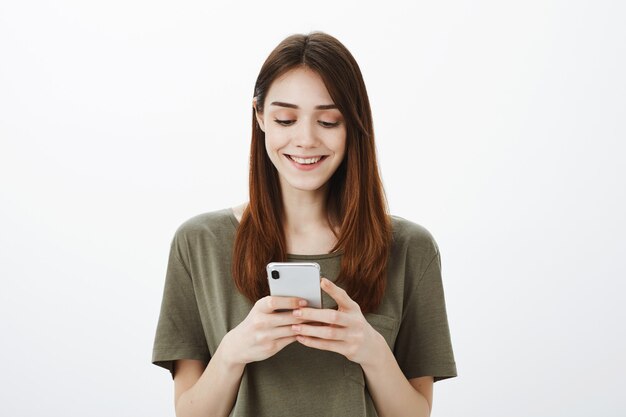 Portrait of a woman in a dark green Tshirt