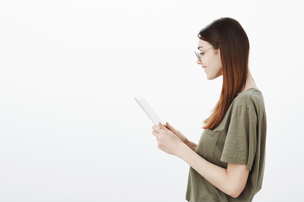 Portrait of a woman in a dark green Tshirt