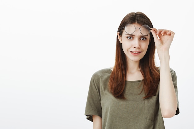 Free photo portrait of a woman in a dark green tshirt