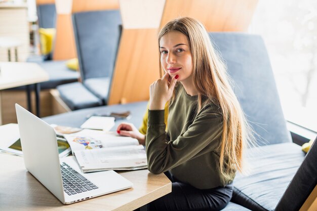 Portrait of woman at desk