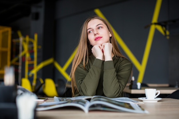 Portrait of woman at desk