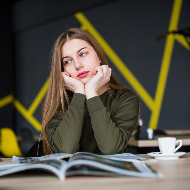 Portrait of woman at desk