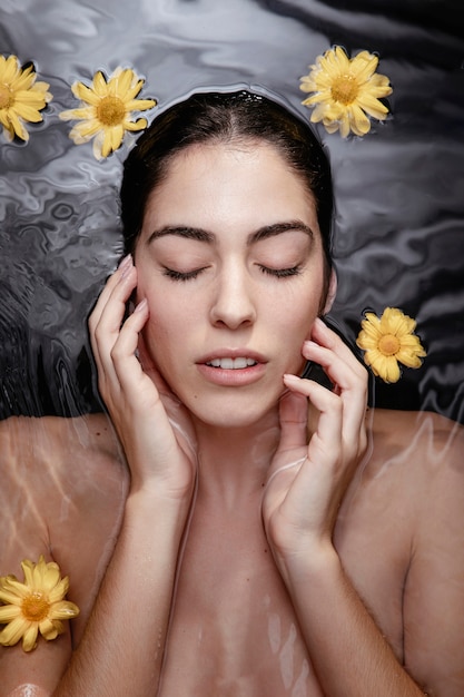 Portrait of woman enjoying beauty treatment