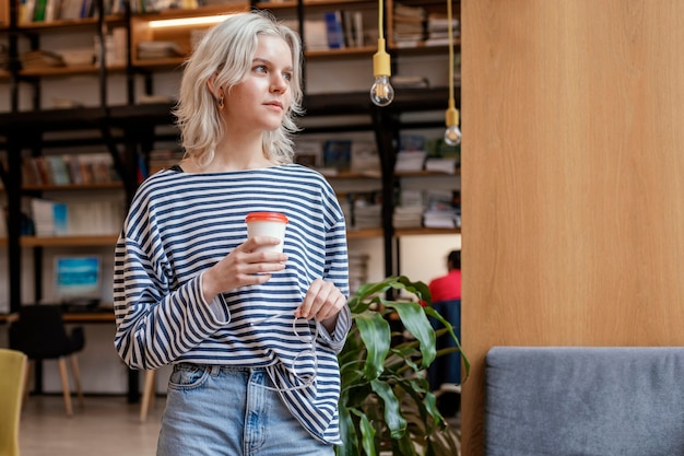 Portrait woman enjoying cup of coffee