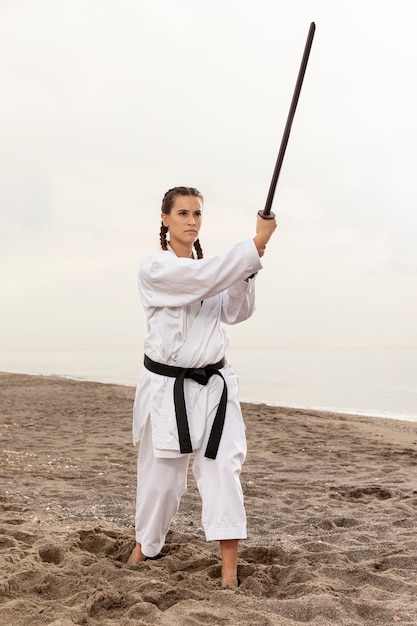 Portrait of woman exercising karate