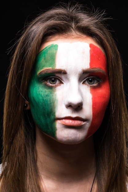 Free photo portrait of woman face supporter fan of mexico national team with painted flag face isolated on black background. fans emotions.