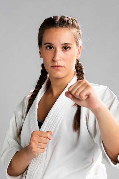 Portrait of a woman fighter ready to get into a combat