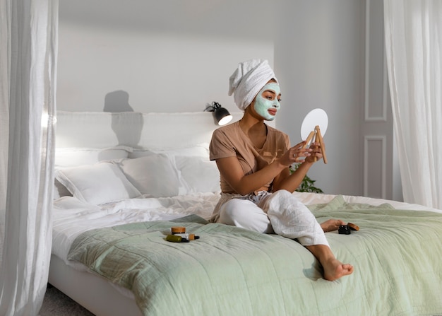 Portrait of woman during her beauty routine at home