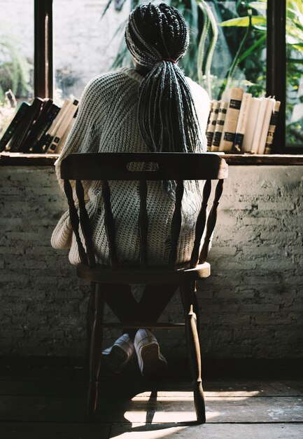 Portrait of a woman looking outside