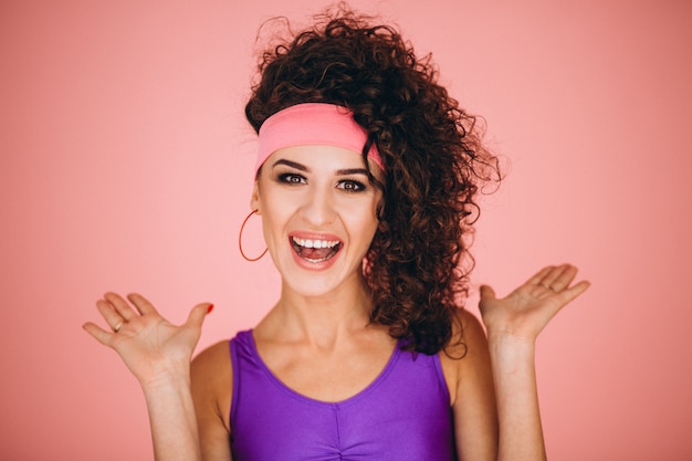 Portrait of woman on pink background isolated