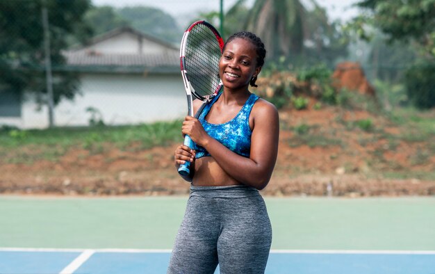 Portrait woman playing tennis