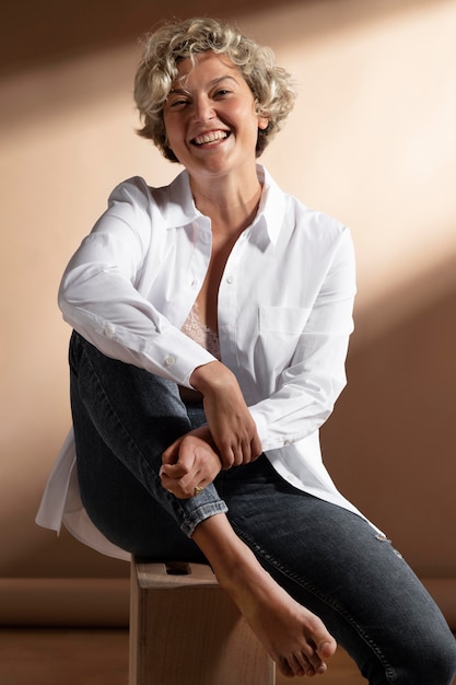 Portrait of woman posing in white shirt