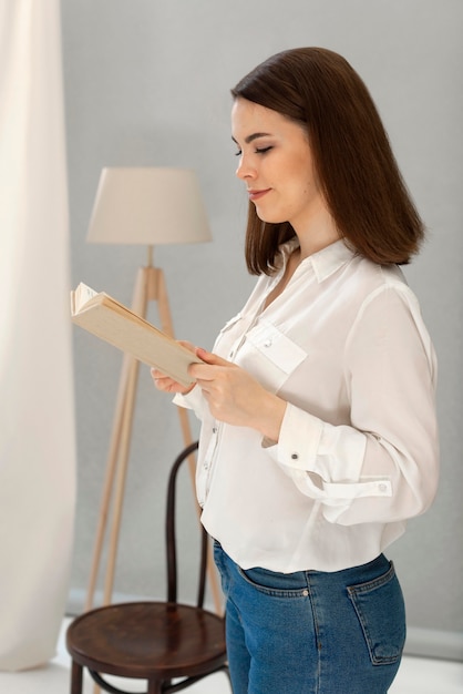 Portrait woman reading book