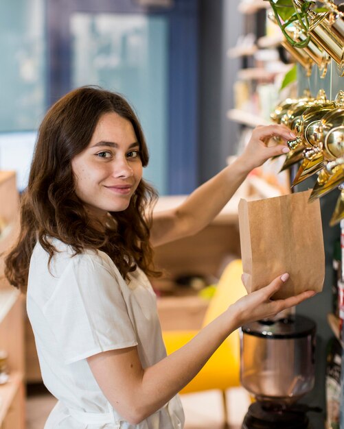 portrait of woman shopping organic products