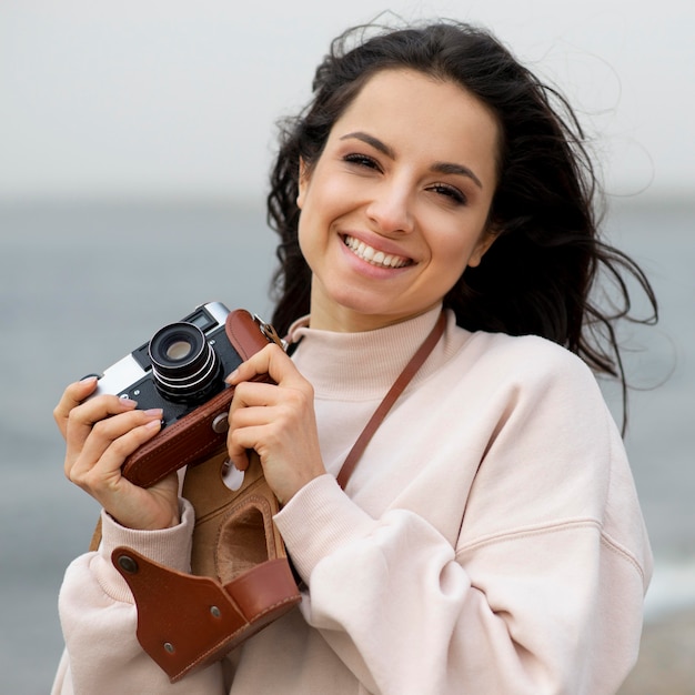 Portrait woman taking photos