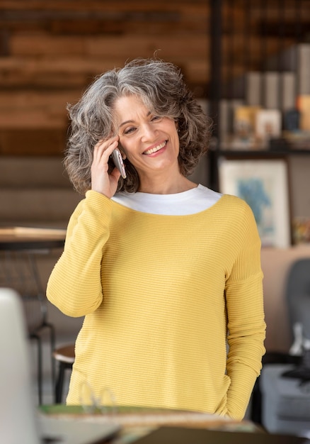 Portrait woman talking on mobile