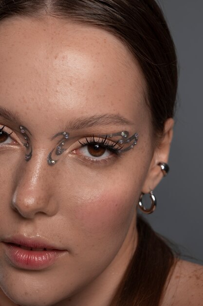 Portrait of woman wearing jewelry makeup