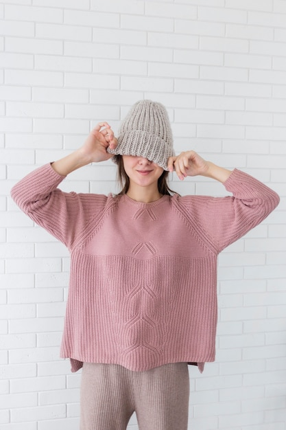 Portrait woman wearing knitted cap