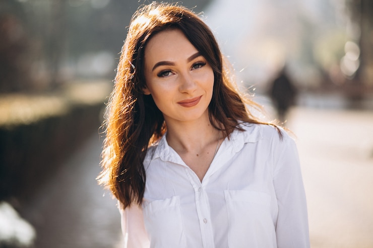 Free Photo portrait of woman in white shirt