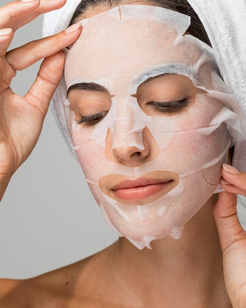 Portrait of woman with face beauty mask