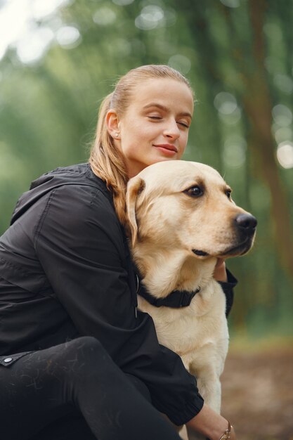Portrait of a woman with her beautiful dog