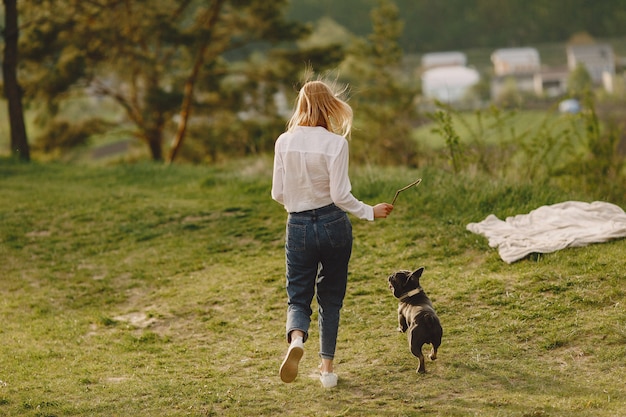 Portrait of a woman with her beautiful dog