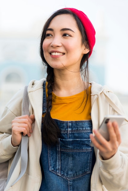 Free photo portrait woman with phone