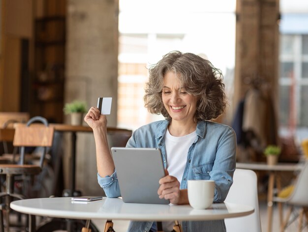 Portrait woman with tablet working