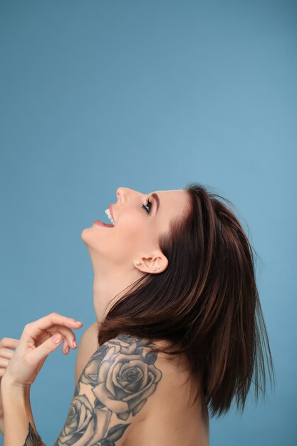 Portrait of woman with tattoo