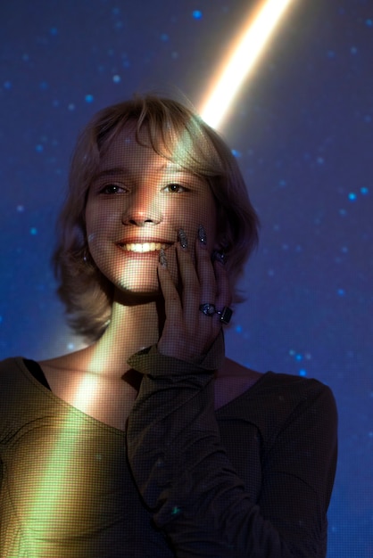Free photo portrait of woman with universe projection texture