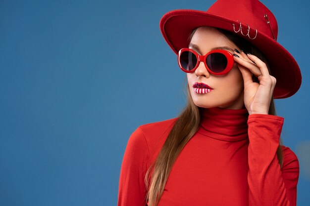 Free photo portrait of woman with usa themed make-up